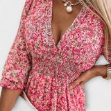 Pinkes Puffärmelkleid mit Blütenmuster